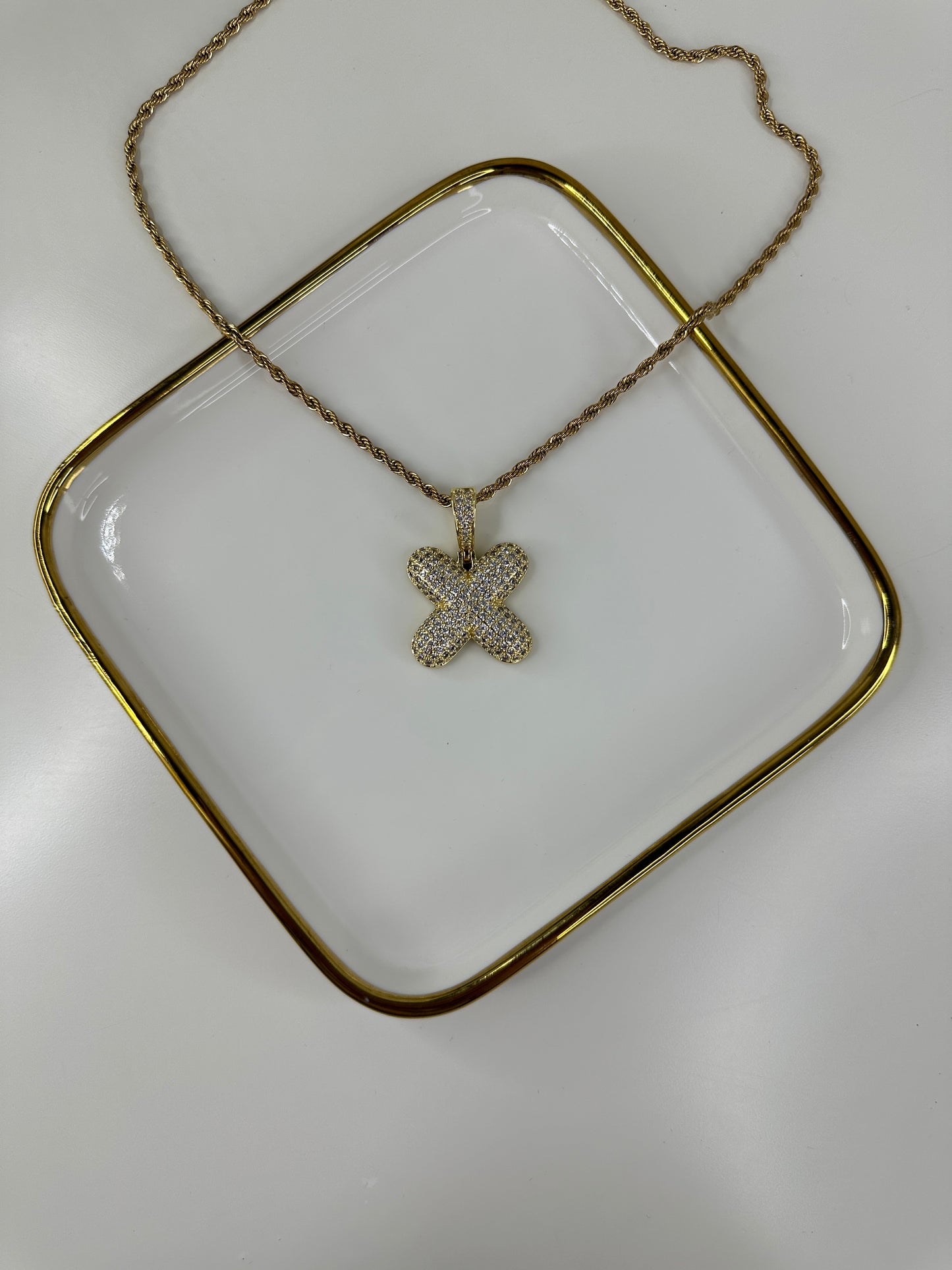Cadena con Inicial X